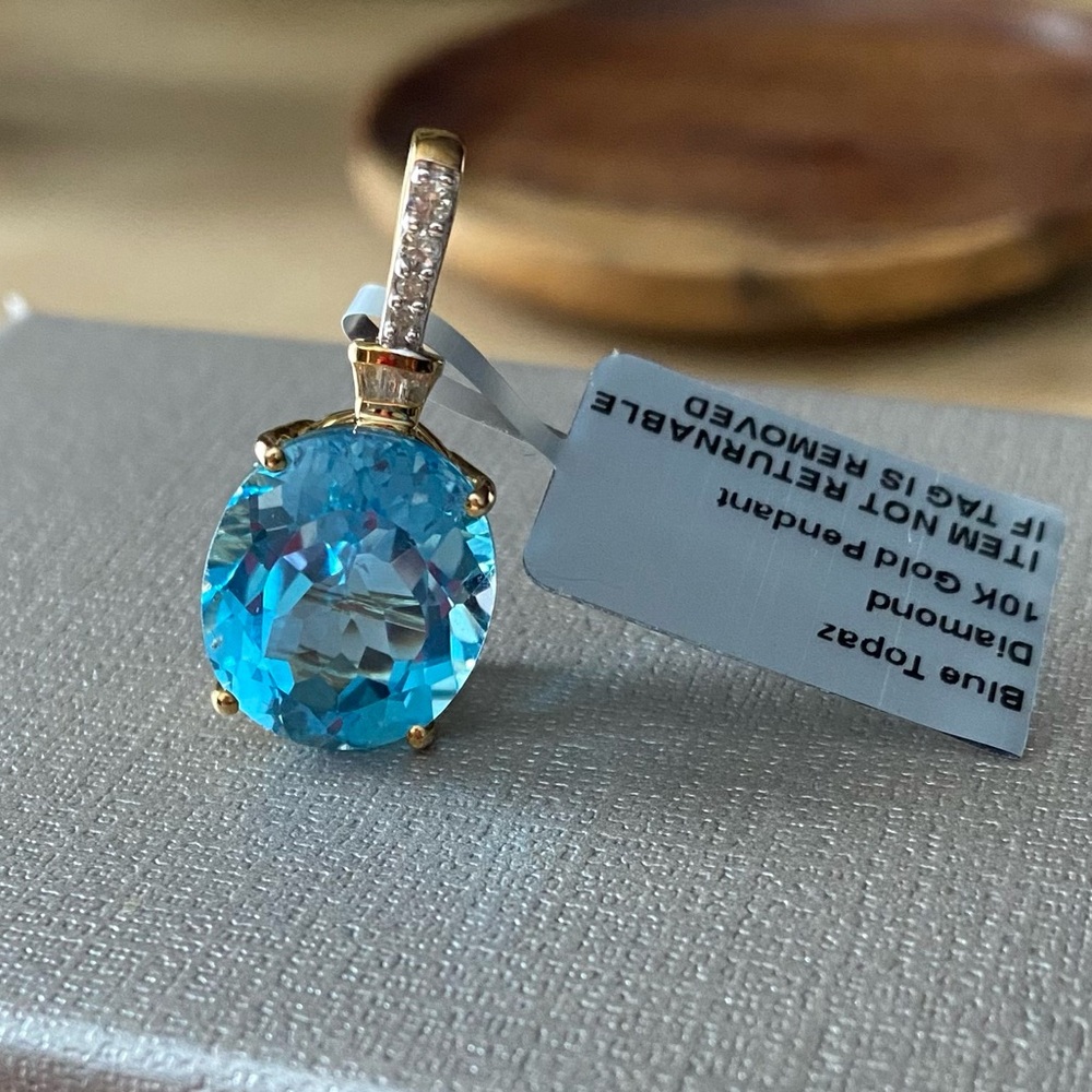 10k gold,  Blue Topaz cushion Pendant with diamonds 10.191 cwt gem,